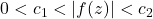 0<c_1<|f(z)|<c_2